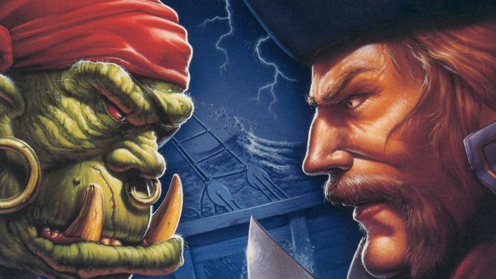 An orc and human face off on Warcraft II's iconic cover art