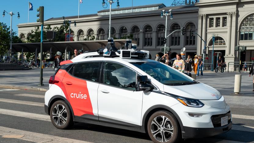 A General Motors Cruise self driving car, often referred to as a robotaxi, drives in front of the Ferry Building on the Embarcedero, San Francisco, California, August 17, 2023. (Photo by Smith Collection/Gado/Getty Images)