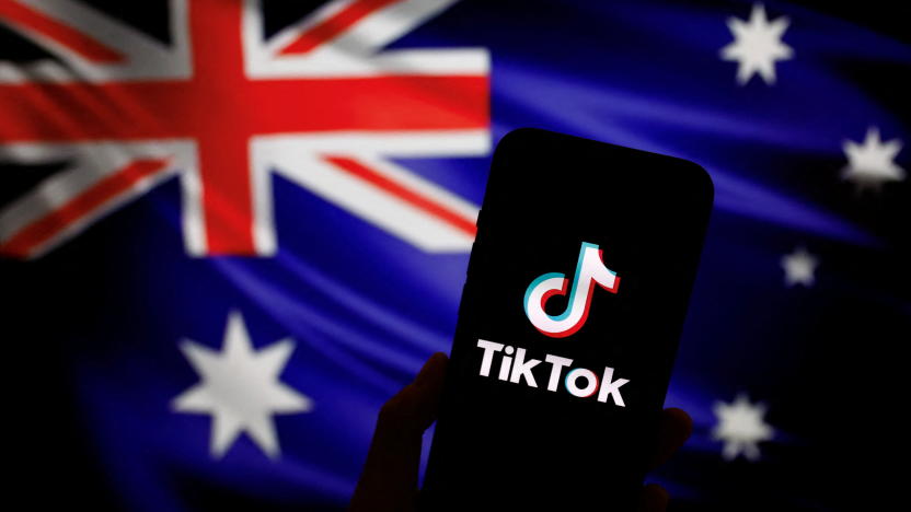 The logo of Chinese-owned video app TikTok is seen on a smartphone in front of an image of the Australian national flag in this illustration picture taken April 4, 2023. REUTERS/Tingshu Wang/Illustration