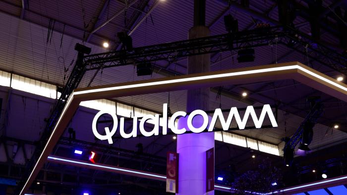 The Qualcomm Incorporated logo is being displayed at their pavilion during the Mobile World Congress in Barcelona, Spain, on February 28, 2024. Qualcomm, an American multinational corporation, is creating semiconductors, software, and services related to wireless technology and is the creator of the Snapdragon suite of system on a chip (SoC) semiconductor products for mobile devices. (Photo by Joan Cros/NurPhoto via Getty Images)