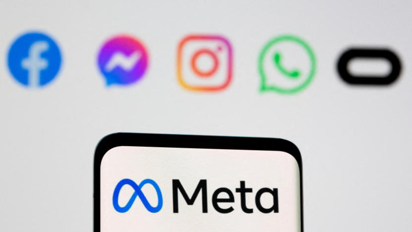 FILE PHOTO: Facebook's new rebrand logo Meta is seen on smartpone in front of displayed logo of Facebook, Messenger, Intagram, Whatsapp, Oculus in this illustration picture taken October 28, 2021. REUTERS/Dado Ruvic/Illustration/File Photo